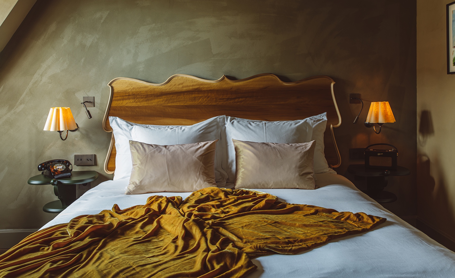 Bed in room at boutique hotel De Durgerdam